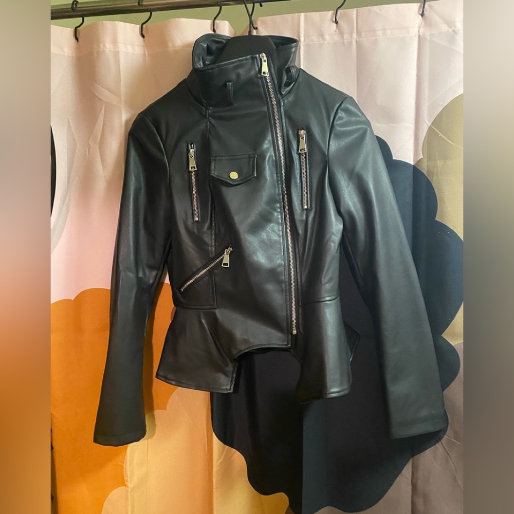 Faux leather jacket high color ruffled bottom worn once very cute ladies